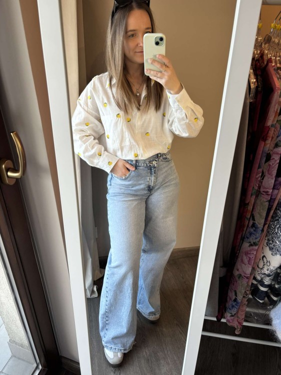 Jeansy damskie szerokie, jeansy damskie szerokie nogawki, jeansy z asymetrycznym zapięciem, jeansy  damskie Wide leg